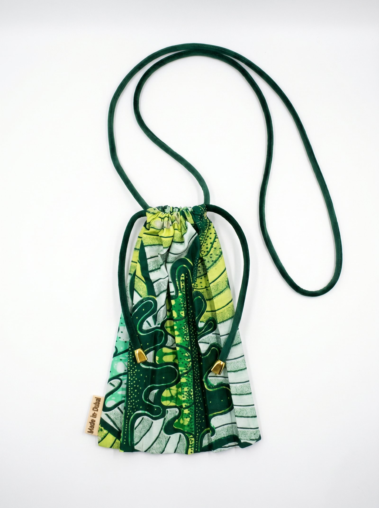 https://veline.ae/storage/photos/1/Summer Bags - E-commerce/Tausi_Emerald_Cross.JPG